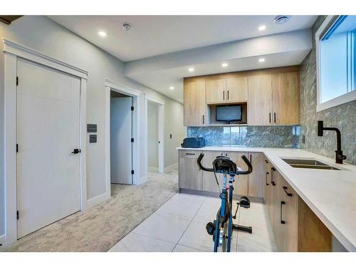 22 Chelsea Bay, Chestermere, AB - Indoor Photo Showing Kitchen With Double Sink