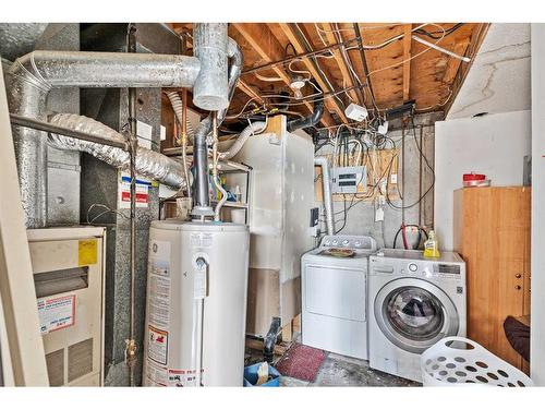 6128 Madigan Drive Ne, Calgary, AB - Indoor Photo Showing Laundry Room