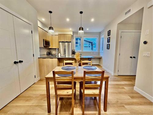 202I-209 Stewart Creek Rise, Canmore, AB - Indoor Photo Showing Dining Room