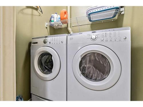 37 Rowland, Okotoks, AB - Indoor Photo Showing Laundry Room