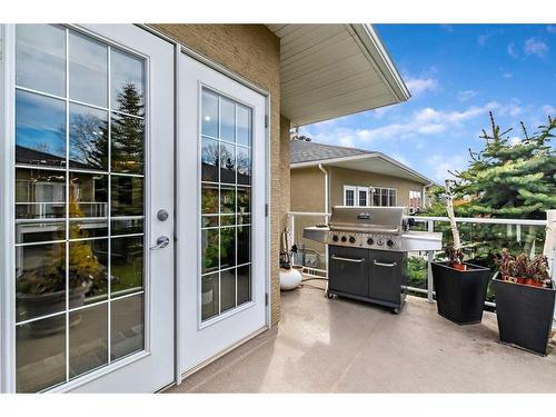 37 Rowland, Okotoks, AB - Outdoor With Deck Patio Veranda With Exterior