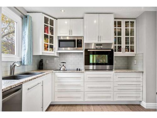 20-219 90 Avenue Se, Calgary, AB - Indoor Photo Showing Kitchen With Double Sink With Upgraded Kitchen