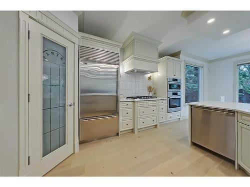 11 Aspen Ridge Lane Sw, Calgary, AB - Indoor Photo Showing Kitchen With Upgraded Kitchen