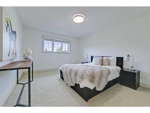 11 Aspen Ridge Lane Sw, Calgary, AB - Indoor Photo Showing Bedroom