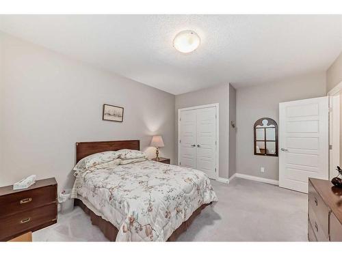 33 Fireside Landing, Cochrane, AB - Indoor Photo Showing Bedroom