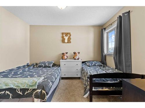 95 Valarosa Drive, Didsbury, AB - Indoor Photo Showing Bedroom