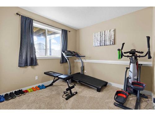 95 Valarosa Drive, Didsbury, AB - Indoor Photo Showing Gym Room