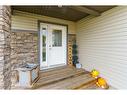 95 Valarosa Drive, Didsbury, AB  - Outdoor With Deck Patio Veranda With Exterior 