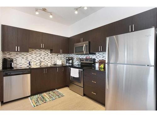 317-117 Copperpond Common Se, Calgary, AB - Indoor Photo Showing Kitchen With Upgraded Kitchen