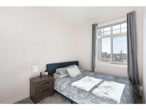 317-117 Copperpond Common Se, Calgary, AB - Indoor Photo Showing Bedroom