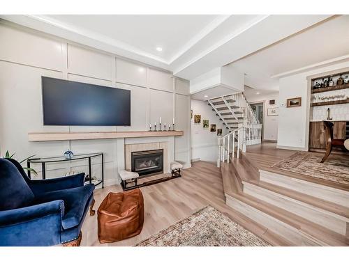 254-4037 42 Street Nw, Calgary, AB - Indoor Photo Showing Living Room With Fireplace