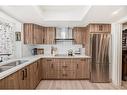 254-4037 42 Street Nw, Calgary, AB  - Indoor Photo Showing Kitchen With Double Sink 