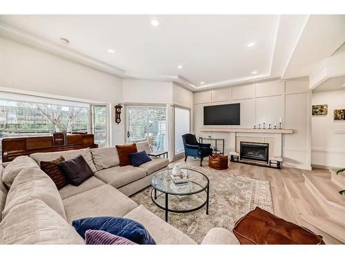 254-4037 42 Street Nw, Calgary, AB - Indoor Photo Showing Living Room With Fireplace