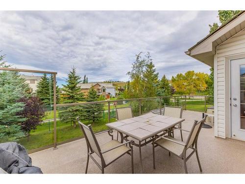 159 Gleneagles View, Cochrane, AB - Outdoor With Deck Patio Veranda With Exterior