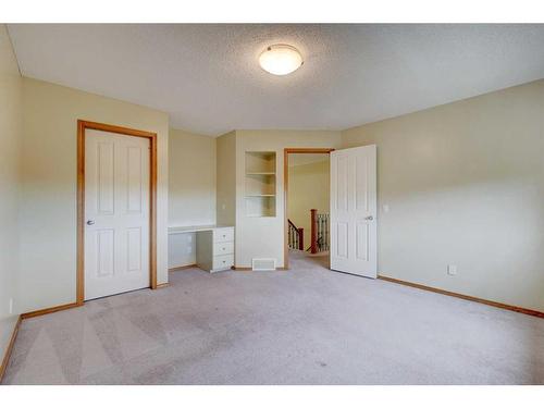 159 Gleneagles View, Cochrane, AB - Indoor Photo Showing Other Room