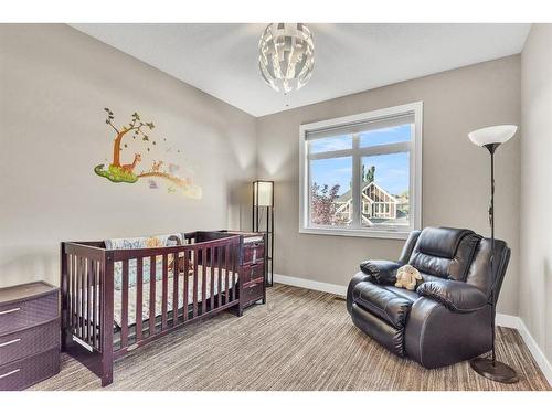 71 Elmont Rise Sw, Calgary, AB - Indoor Photo Showing Bedroom