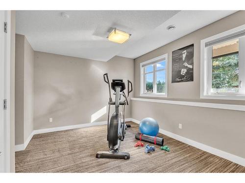 71 Elmont Rise Sw, Calgary, AB - Indoor Photo Showing Gym Room