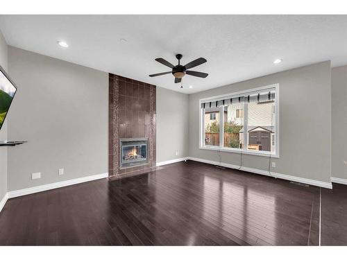 129 Saddlelake Green Ne, Calgary, AB - Indoor Photo Showing Living Room With Fireplace