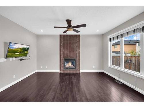 129 Saddlelake Green Ne, Calgary, AB - Indoor Photo Showing Other Room With Fireplace