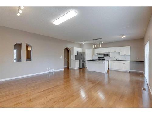 10349 Tuscany Hills Way Nw, Calgary, AB - Indoor Photo Showing Living Room With Fireplace