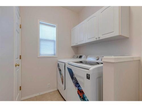 10349 Tuscany Hills Way Nw, Calgary, AB - Indoor Photo Showing Laundry Room