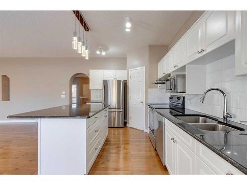 10349 Tuscany Hills Way Nw, Calgary, AB - Indoor Photo Showing Kitchen With Stainless Steel Kitchen With Double Sink With Upgraded Kitchen