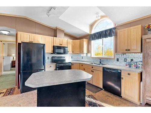 30313 Range Road 13, Rural Mountain View County, AB - Indoor Photo Showing Kitchen With Double Sink