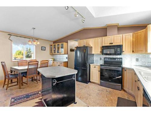 30313 Range Road 13, Rural Mountain View County, AB - Indoor Photo Showing Kitchen With Double Sink