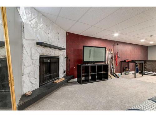 55 Margate Place Ne, Calgary, AB - Indoor With Fireplace