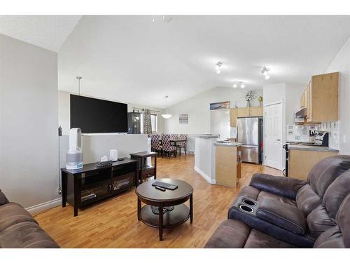 1056 Bridlemeadows Manor Sw, Calgary, AB - Indoor Photo Showing Living Room