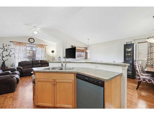 1056 Bridlemeadows Manor Sw, Calgary, AB - Indoor Photo Showing Kitchen With Double Sink