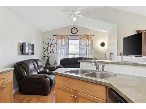 1056 Bridlemeadows Manor Sw, Calgary, AB - Indoor Photo Showing Kitchen With Double Sink