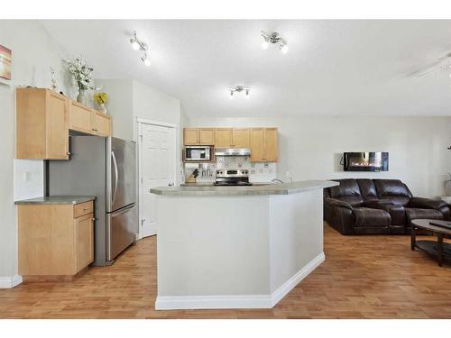 1056 Bridlemeadows Manor Sw, Calgary, AB - Indoor Photo Showing Kitchen