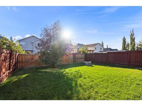 1056 Bridlemeadows Manor Sw, Calgary, AB - Outdoor With Backyard