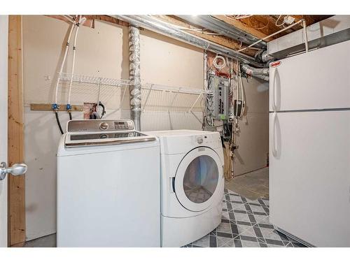 119 Sagewood Grove Sw, Airdrie, AB - Indoor Photo Showing Laundry Room