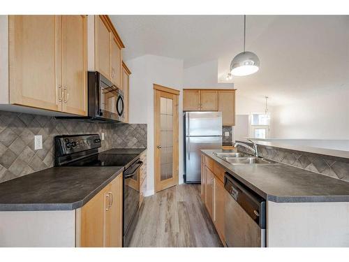 119 Sagewood Grove Sw, Airdrie, AB - Indoor Photo Showing Kitchen With Double Sink