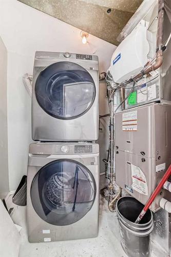 101-5404 10 Avenue Se, Calgary, AB - Indoor Photo Showing Laundry Room