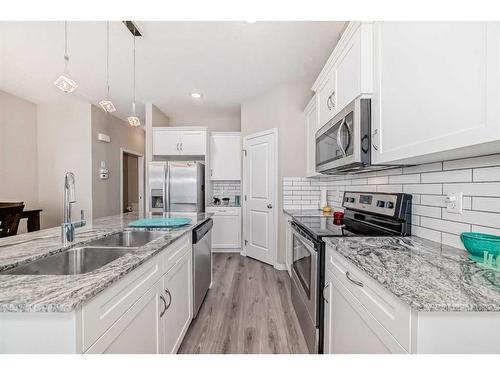 84 Legacy Glen Street Se, Calgary, AB - Indoor Photo Showing Kitchen With Stainless Steel Kitchen With Double Sink With Upgraded Kitchen