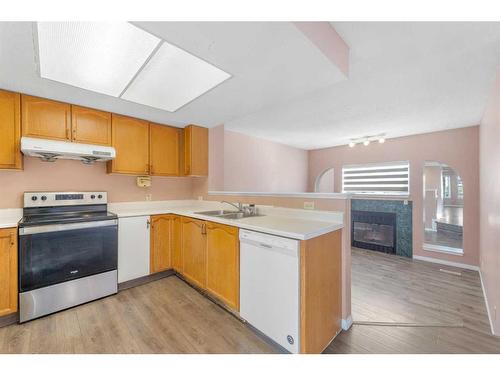 80 Costa Mesa Close Ne, Calgary, AB - Indoor Photo Showing Kitchen With Double Sink