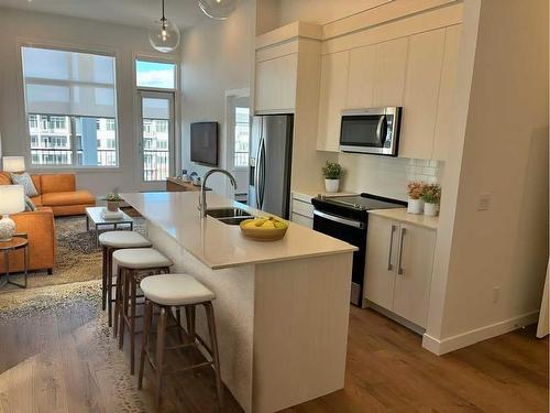 1516-395 Skyview Parkway Ne, Calgary, AB - Indoor Photo Showing Kitchen With Double Sink With Upgraded Kitchen