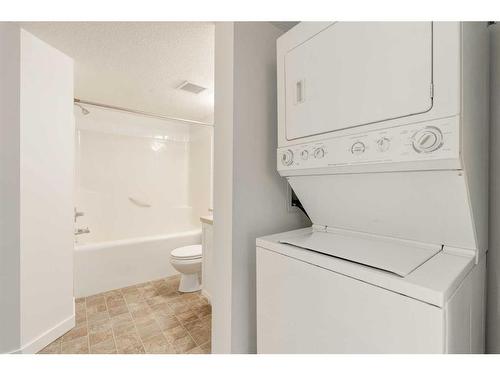 201-2000 Applevillage Court Se, Calgary, AB - Indoor Photo Showing Laundry Room