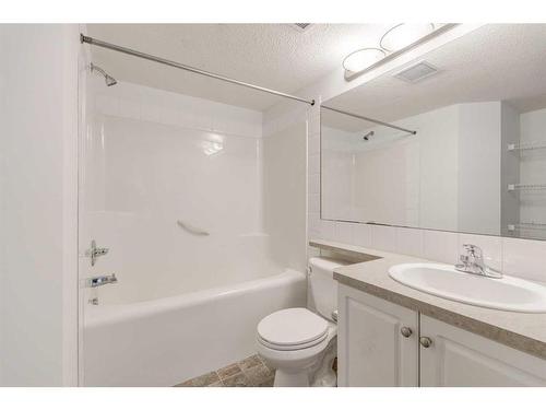 201-2000 Applevillage Court Se, Calgary, AB - Indoor Photo Showing Bathroom