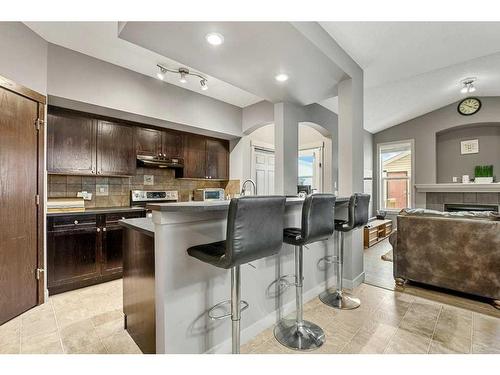 212 Silverado Range Close Sw, Calgary, AB - Indoor Photo Showing Kitchen With Upgraded Kitchen