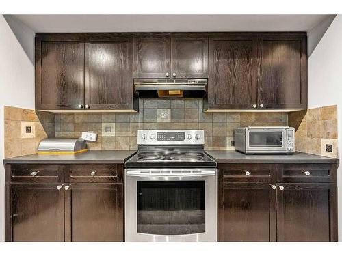 212 Silverado Range Close Sw, Calgary, AB - Indoor Photo Showing Kitchen