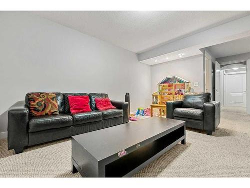 212 Silverado Range Close Sw, Calgary, AB - Indoor Photo Showing Living Room