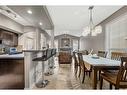 212 Silverado Range Close Sw, Calgary, AB  - Indoor Photo Showing Dining Room 