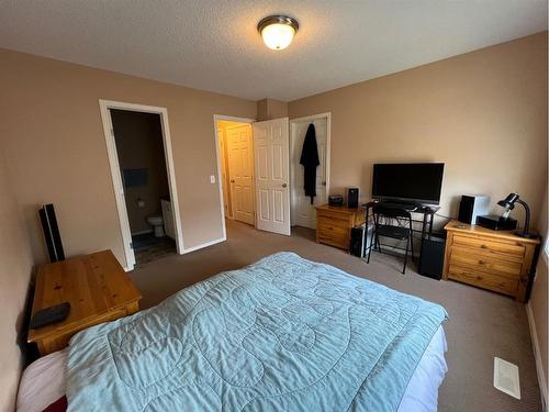 913 Prairie Sound Circle, High River, AB - Indoor Photo Showing Bedroom