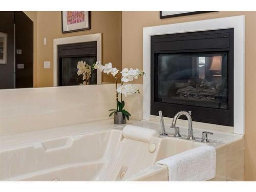 330 Diamond Drive Se, Calgary, AB - Indoor Photo Showing Living Room With Fireplace