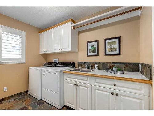 330 Diamond Drive Se, Calgary, AB - Indoor Photo Showing Laundry Room