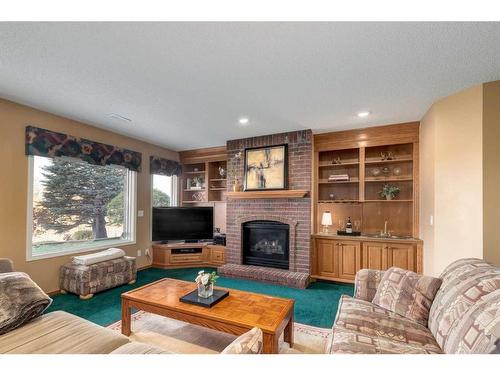 330 Diamond Drive Se, Calgary, AB - Indoor Photo Showing Living Room With Fireplace